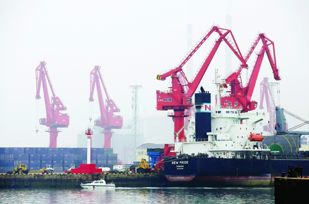 FILE PHOTO: A crude oil tanker is seen at Qingdao Port, Shandong province, China