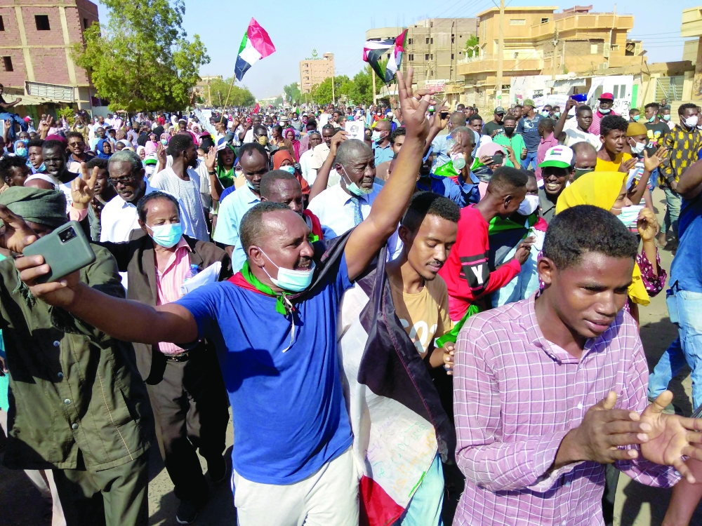 Sudanese anti-coup protesters gather amid ongoing protests against last month's widely condemned military takeover, in the "Street 40" of the capital's twin city of Umdurman on Wednesday. - AFP