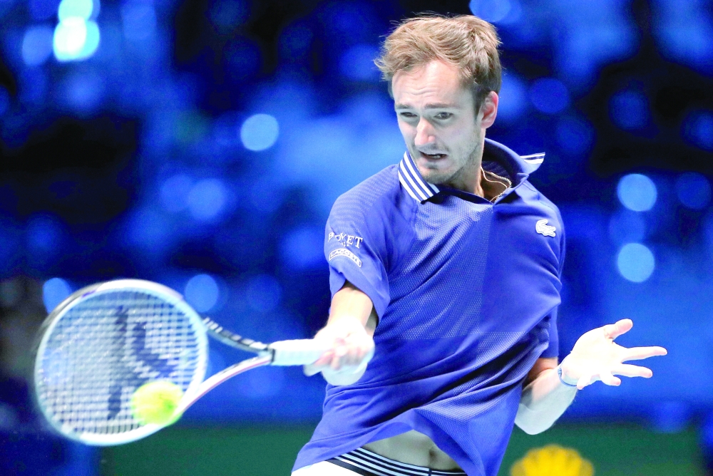 Russia's Daniil Medvedev in action during his group stage match against Italy's Jannik Sinner. -- Reuters