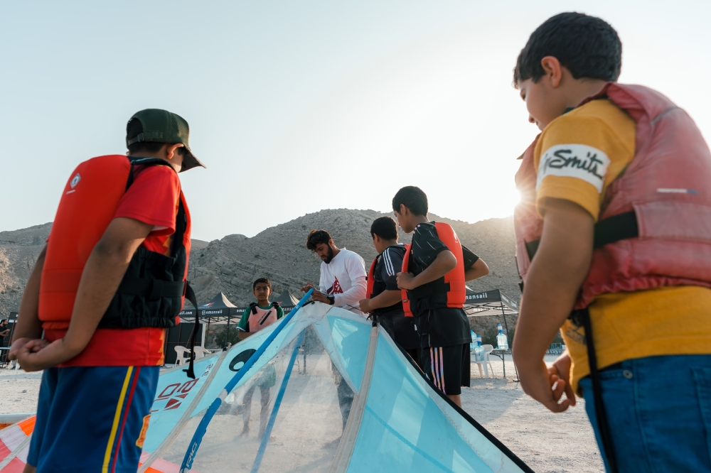Trying a hand at  windsurfing as part of the festival 