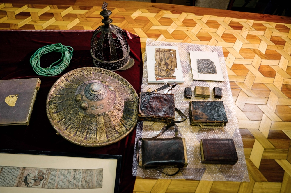 Recovered artifacts on display at the National Museum two months after they were formally handed over at a ceremony in London. - AFP 