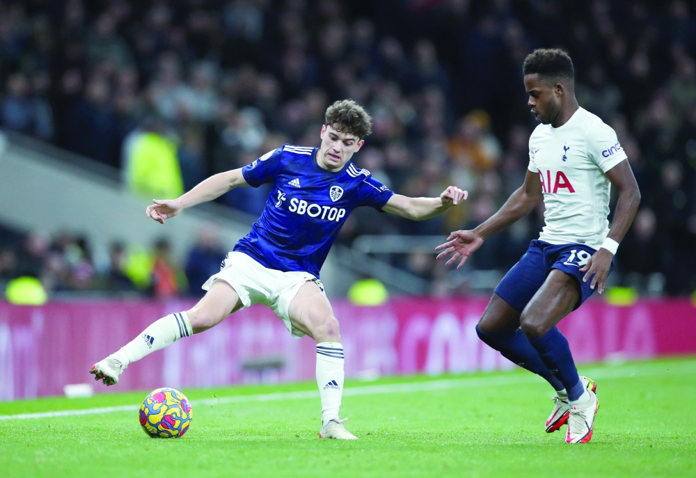 Leeds United's Daniel James in action with Tottenham Hotspur's Ryan Sessegnon. -- Reuters