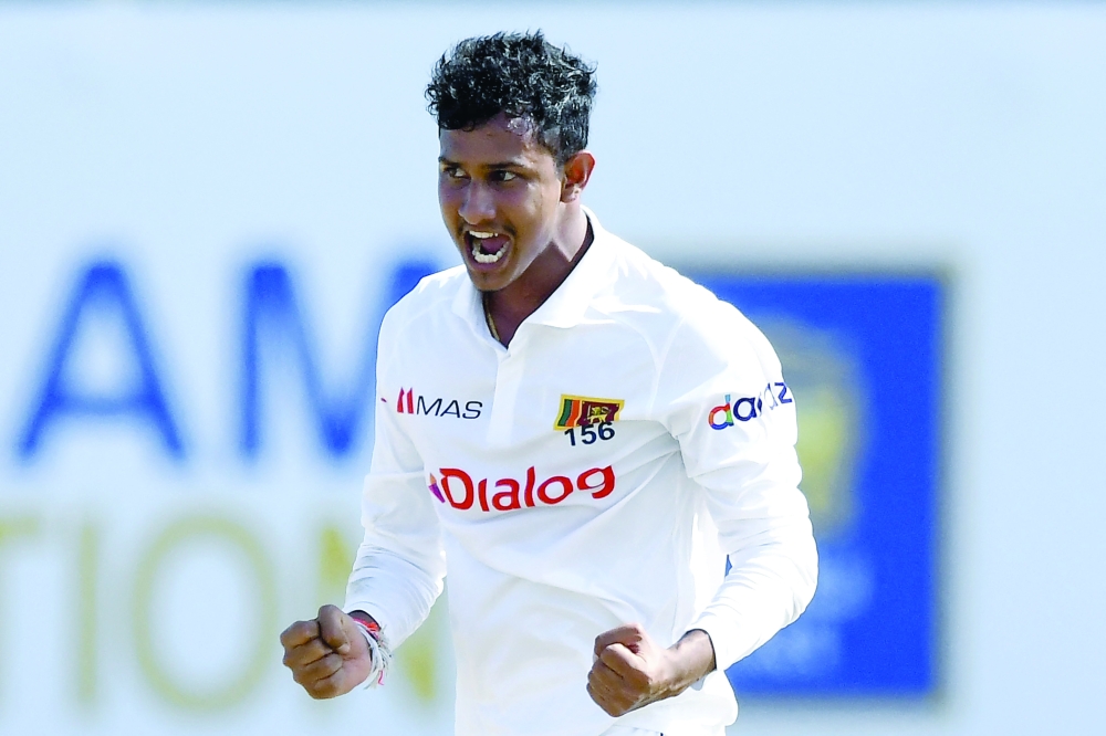 Sri Lanka’s Praveen Jayawickrama celebrates after the dismissal of West Indies’ Nkrumah Bonner. — AFP