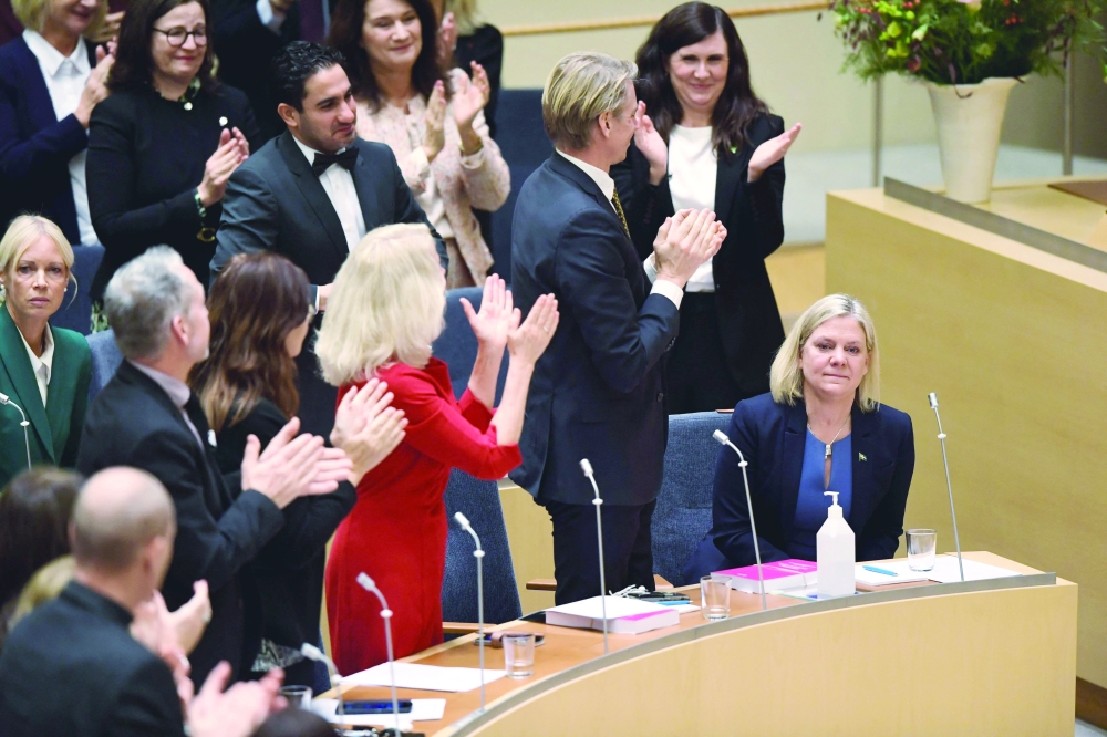 Current Finance Minister and Scocial Democratic Party leader Magdalena Andersson reacts while she is voted as Sweden's first female prime minister at the Swedish parliament in Stockholm. - AFP

