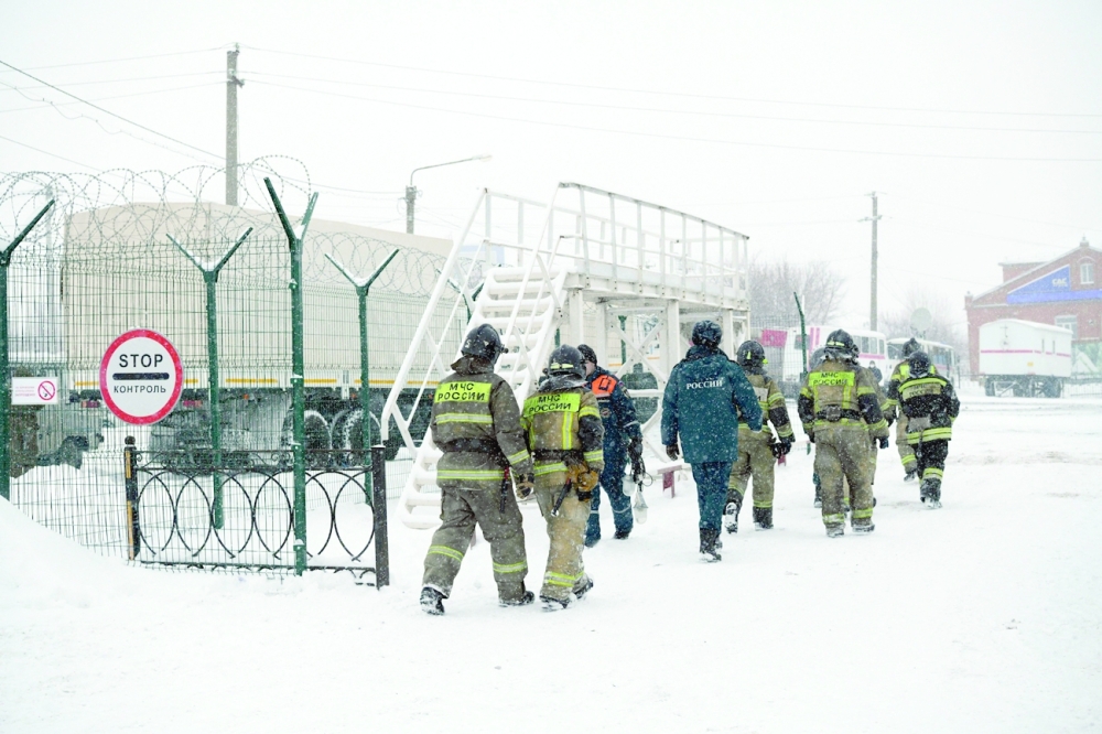 Investigators and rescuers arrive to Listvyazhnaya coal in the Kemerovo region near the town of Belovo on Thursday. - AFP 
