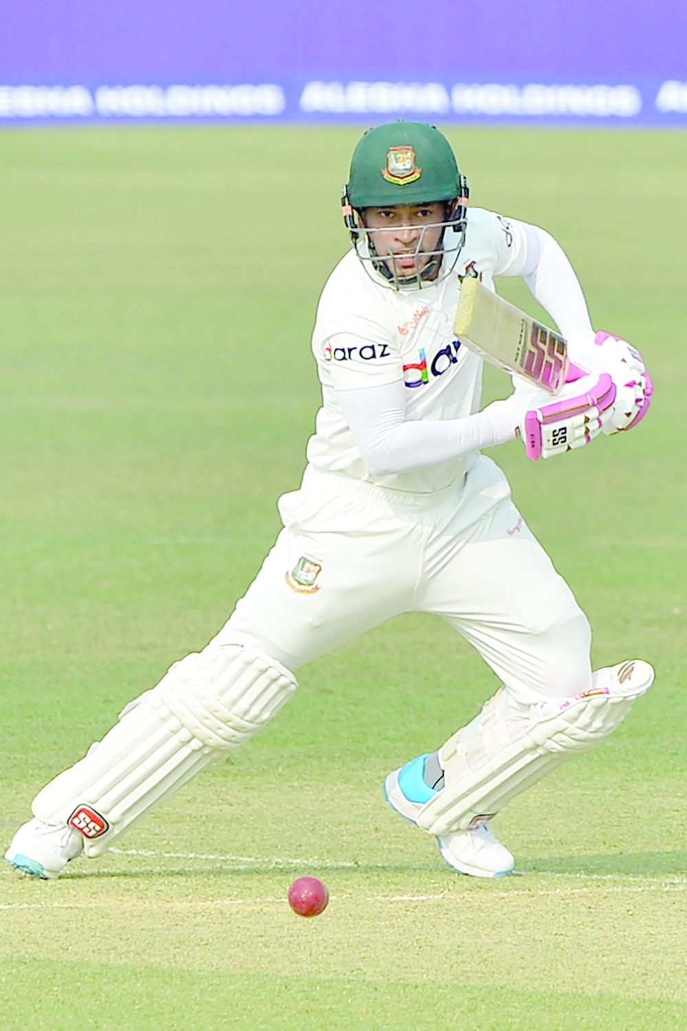 Bangladesh's Mushfiqur Rahim watches the ball after playing a shot during the first day of the first Test. -- AFP