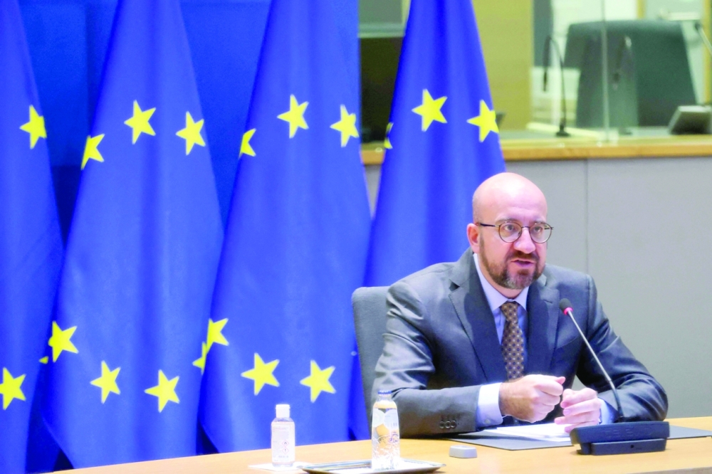 European Council President Charles Michel gives a speech via a video conference during a special session of World Health Assembly at the European Council building in Brussels. - AFP