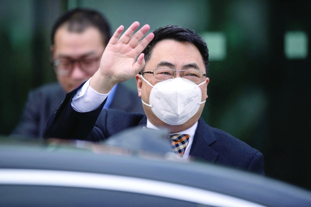 China's Ambassador to the Permanent Mission at the United Nations Wang Qun arrives at the Coburg Palais meeting in Vienna. - AFP 