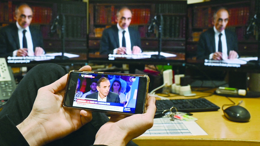 French far-right media pundit Eric Zemmour announces his candidacy for the 2022 Presidential election in a video broadcast on social media in Paris. - AFP

