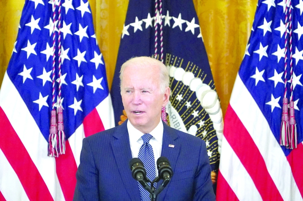 US President Joe Biden speaks during a menorah lighting ceremony in celebration of Hanukkah in the East Room of the White House in Washington, DC on December 1, 2021. (Photo by MANDEL NGAN / AFP)
