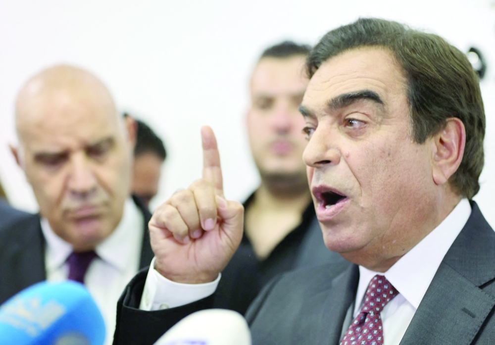 George Kordahi holds a press conference in Beirut on Friday to announce his resignation. - AFP 