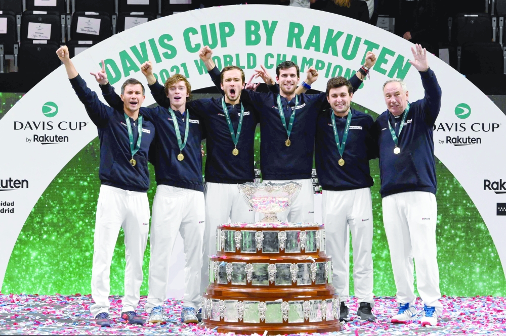(From L) Russia's Evgeny Donskoy, Andrey Rublev, Daniil Medvedev, Karen Khachanov, Aslan Karatsev and Russia's Davis Cup captain Shamil Tarpischev pose for pictures with the trophy after winning the Davis Cup. -- AFP