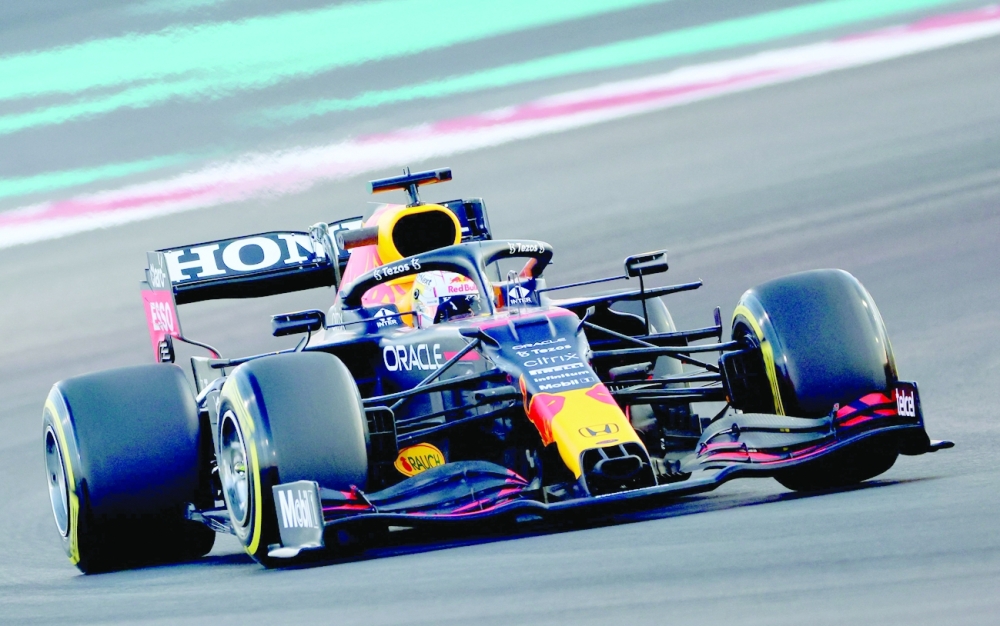 Red Bull's Dutch driver Max Verstappen drives at the Yas Marina Circuit during the second free practice session of the Abu Dhabi Grand Prix. -- AFP