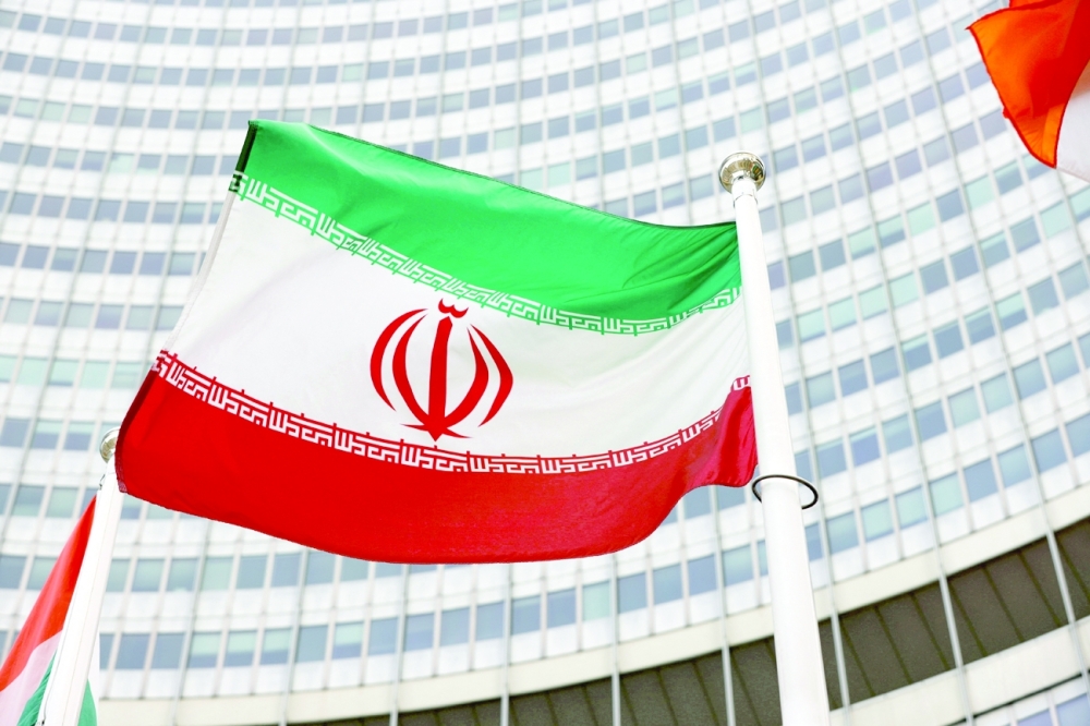 The Iranian flag waves in front of the International Atomic Energy Agency (IAEA) headquarters in Vienna. - Reuters file photo