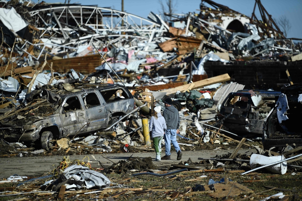  Tornado damage is seen after extreme weather hit the region December 12, 2021, in Mayfield, Kentucky.