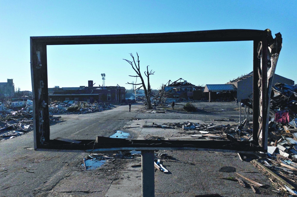 Tornado damage is seen after extreme weather hit the region in Mayfield, Kentucky. Dozens of devastating tornadoes roared through five US states on Saturday and Sunday leaving more than 80 people dead in what President Joe Biden said was ‘one of the largest’ storm outbreaks in history. 
— AFP