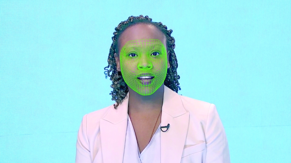 A green wireframe model covers an actor's lower face during the creation of a synthetic facial reanimation video, known alternatively as a deepfake. -- Reuters