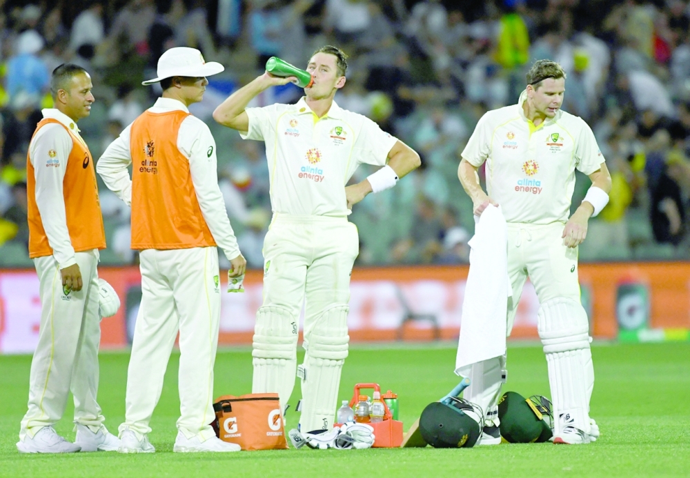 Australia's Marnus Labuschagne and Steven Smith during a break. -- Reuters