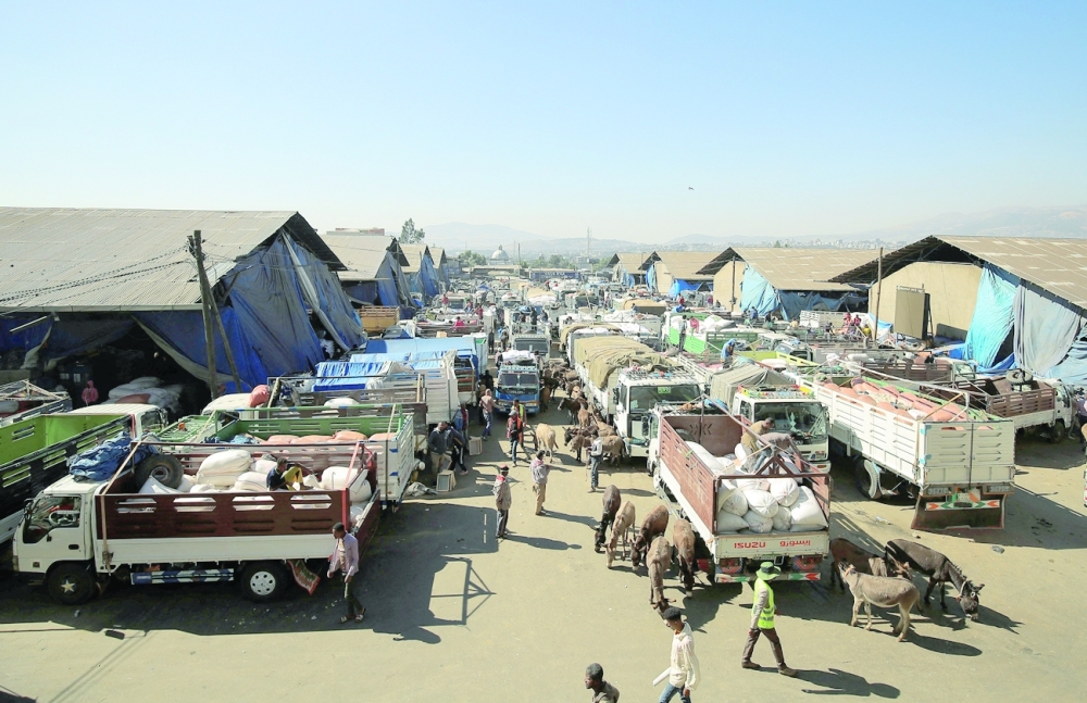 A view shows trucks queuing with sacks of grains at the grain market in Merkato neighbourhood of Addis Ababa. -- Reuters
