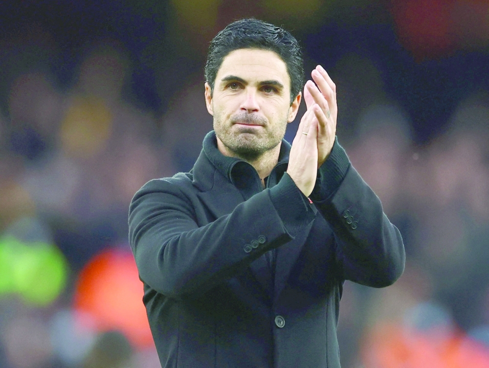 Arsenal manager Mikel Arteta applauds fans after the match. -- Reuters