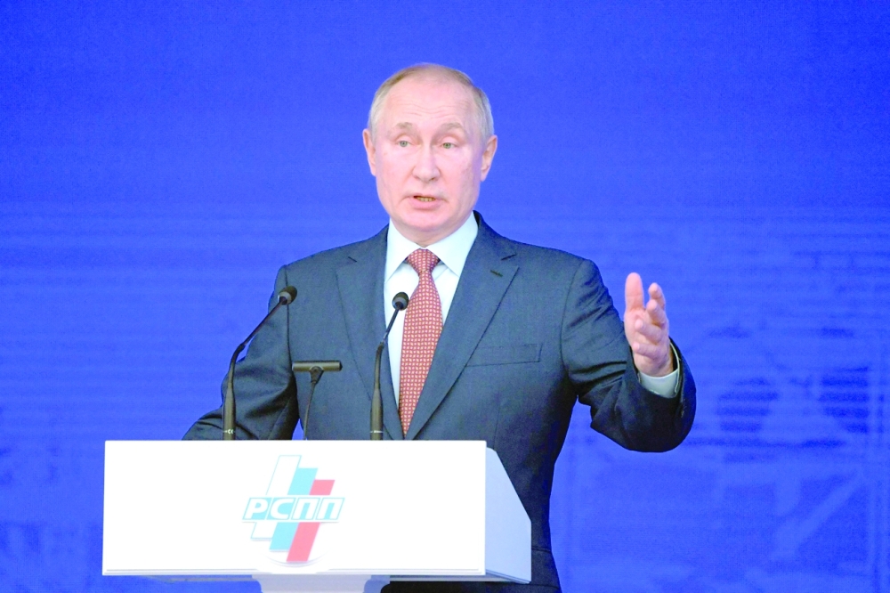 Russian President Vladimir Putin addresses participants of a convention of the Russian Union of Industrialists and Entrepreneurs (RSPP) in Moscow on Friday. - AFP