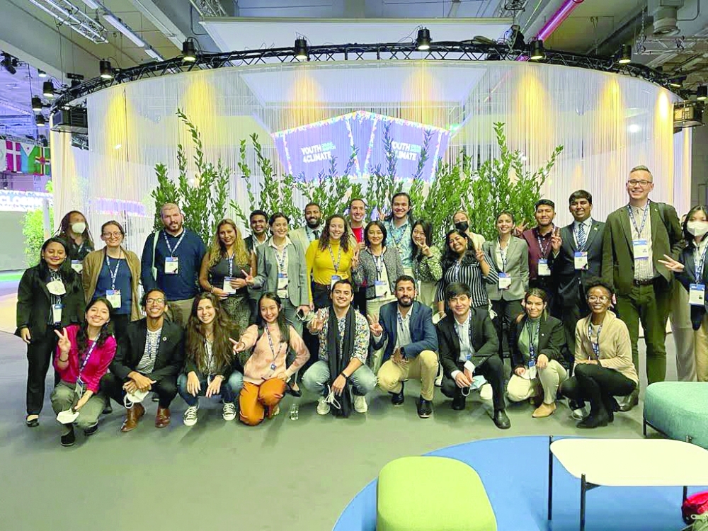 Turki al Risi and Noor Al Hamdan with group