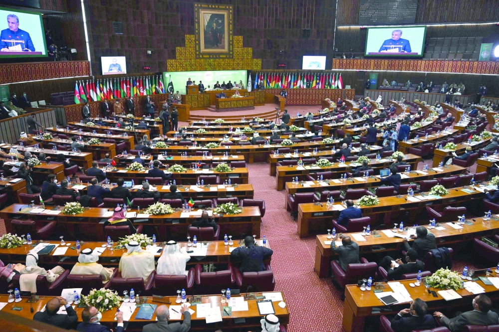 Pakistan's Foreign Minister Shah Mahmood Qureshi addresses the opening of a special meeting of the 57-member Organisation of Islamic Cooperation (OIC) in Islamabad. -- AFP
