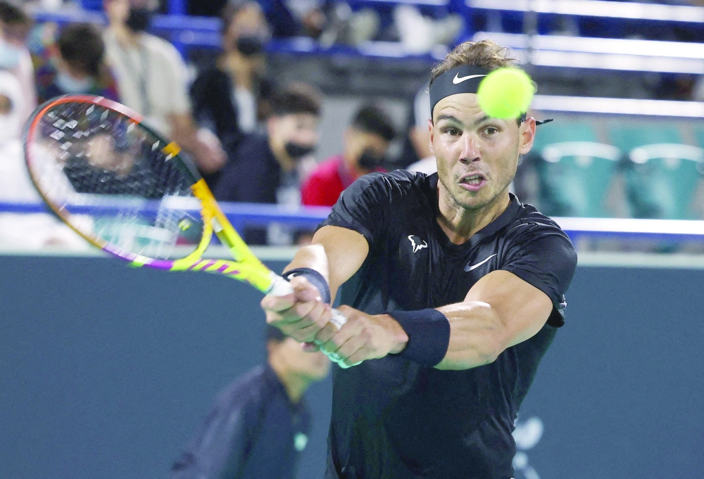 Spain's Rafael Nadal in action in Abu Dhabi. -- Reuters