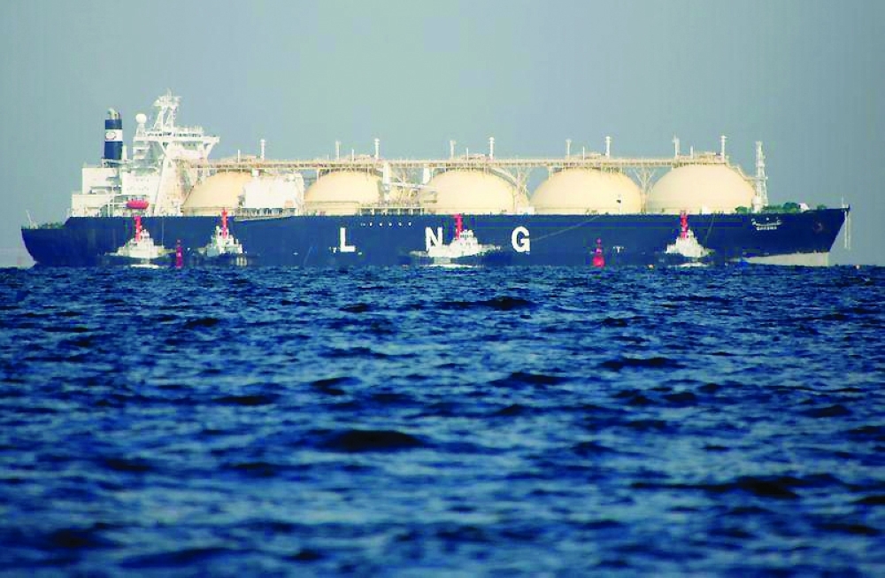 A liquefied natural gas (LNG) tanker is tugged towards a thermal power station in Futtsu, east of Tokyo, Japan. — Reuters