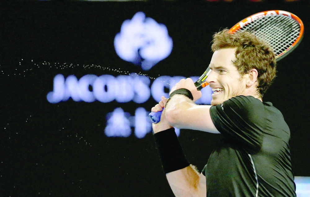 Britain's Andy Murray hits a shot during his final match against Serbia's Novak Djokovic at the 2016 Australian Open. -- Reuters