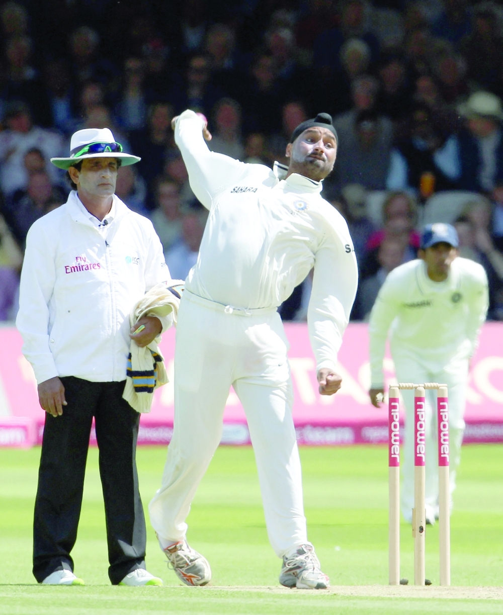 In this file photo taken on July 22, 2011, India's bowler Harbhajan Singh (C) bowls against England during day two of the first Test at Lord's. -- AFP