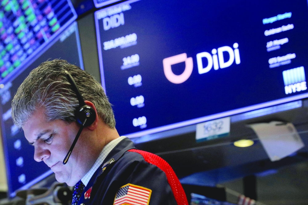 A trader works during the IPO for Chinese ride-hailing company Didi Global Inc on the New York Stock Exchange floor in New York City. — Reuters