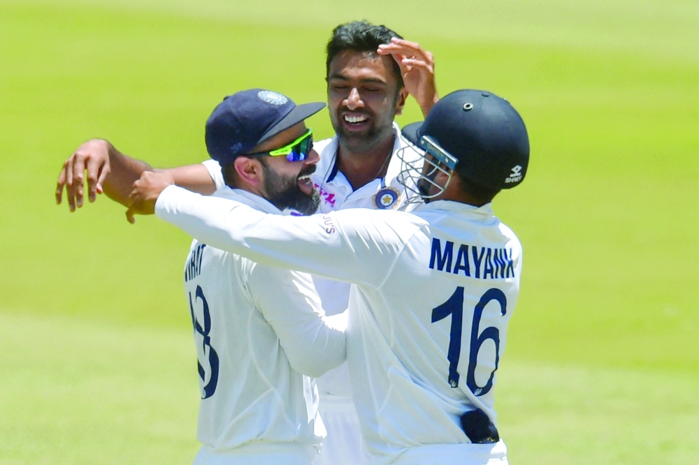 India's Virat Kohli (L) celebrates with Mayank Agarwal (R) after India won the first Test against South Africa at SuperSport Park in Centurion. -- AFP
