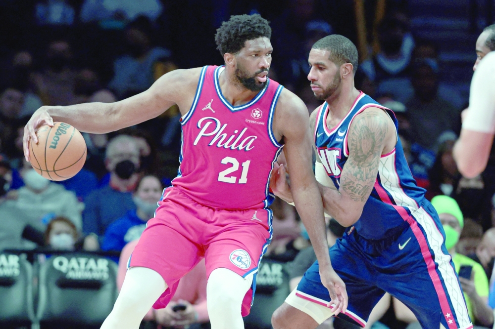 Philadelphia 76ers center Joel Embiid (21) dribbles as Brooklyn Nets center LaMarcus Aldridge (21) defends during the second half at Barclays Center. -- USA Today Sports
