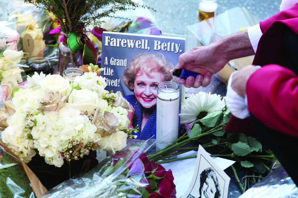 Mourners gather around the Hollywood Walk of Fame star of actor Betty White in Los Angeles, California, on Friday. - Reuters