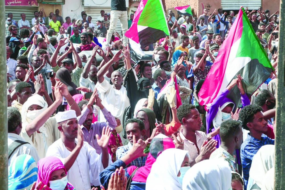 Sudanese demonstrators rally in Al Daim neighbourhood in Khartoum on Sunday. - AFP