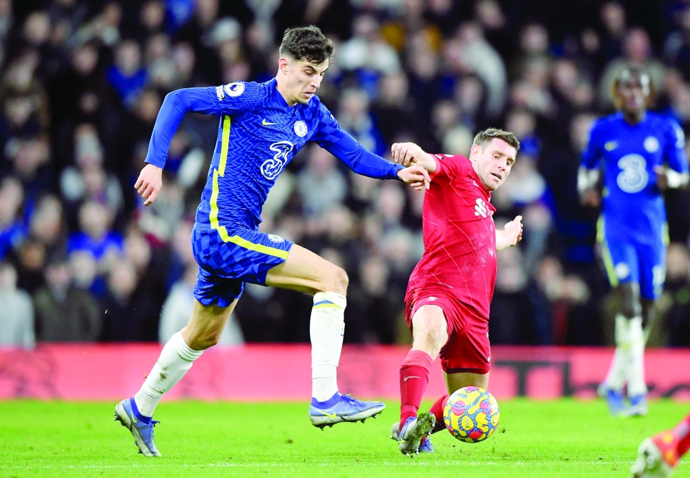 Liverpool's James Milner in action with Chelsea's Kai Havertz. --  Reuters
