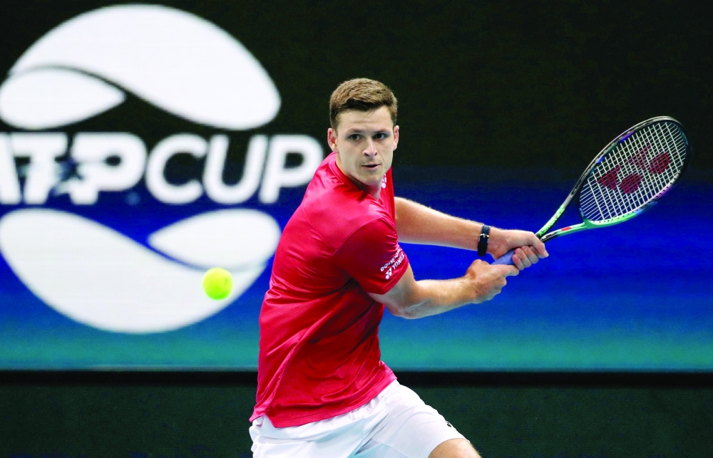 Tennis - ATP Cup - Sydney Olympic Park, Sydney, Australia - January 5, 2022 Poland's Hubert Hurkacz in action during his group stage match against Argentina's Diego Schwartzman REUTERS/Asanka Brendon Ratnayake
