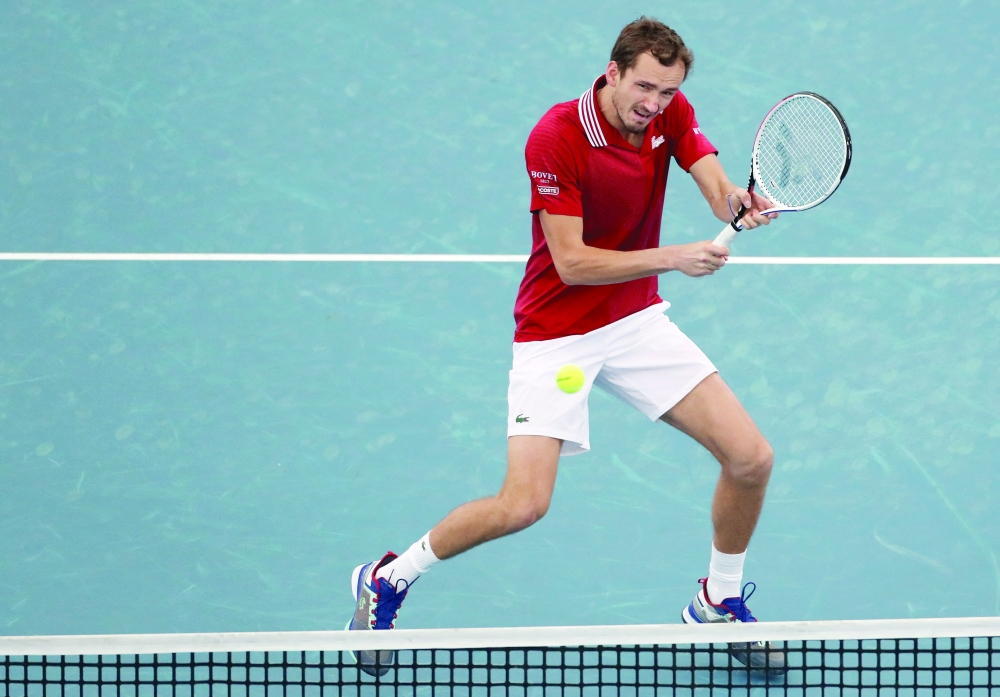 Russia's Daniil Medvedev in action during his group stage doubles match with Roman Safiullin against Italy's Matteo Berrettini and Jannik Sinner. -- Reuters