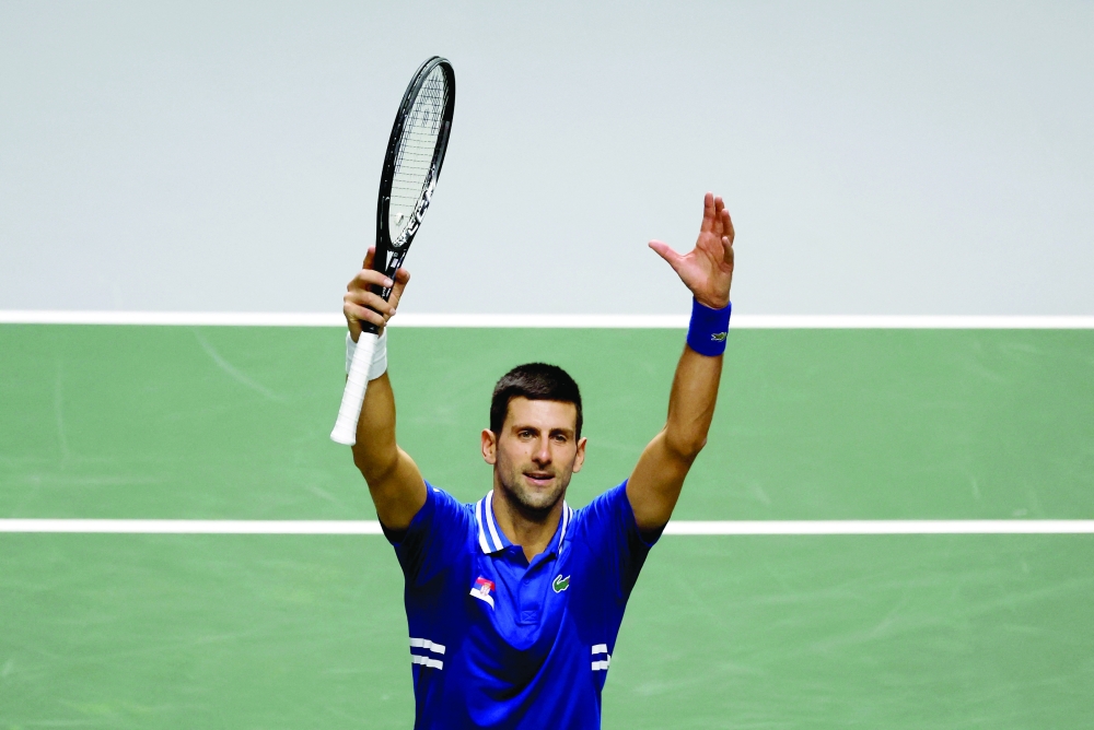 Serbia's Novak Djokovic celebrates winning his match against Croatia's Marin Cilic. -- Reuters