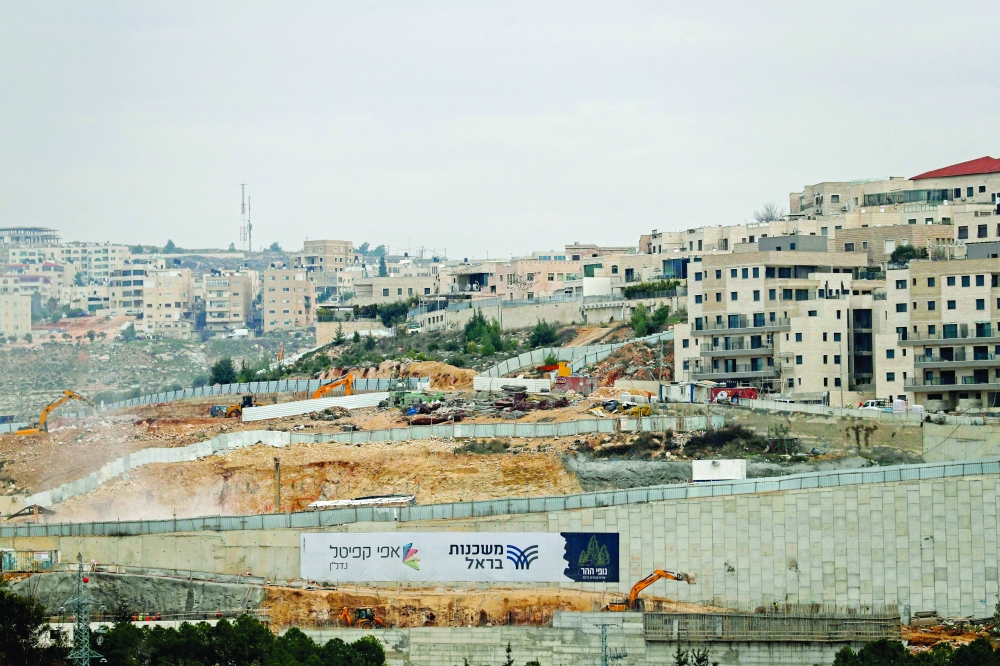 A general view shows ongoing construction work at Ramat Shlomo, a Jewish settlement in the Israeli-annexed eastern sector of Jerusalem. -- AFP
