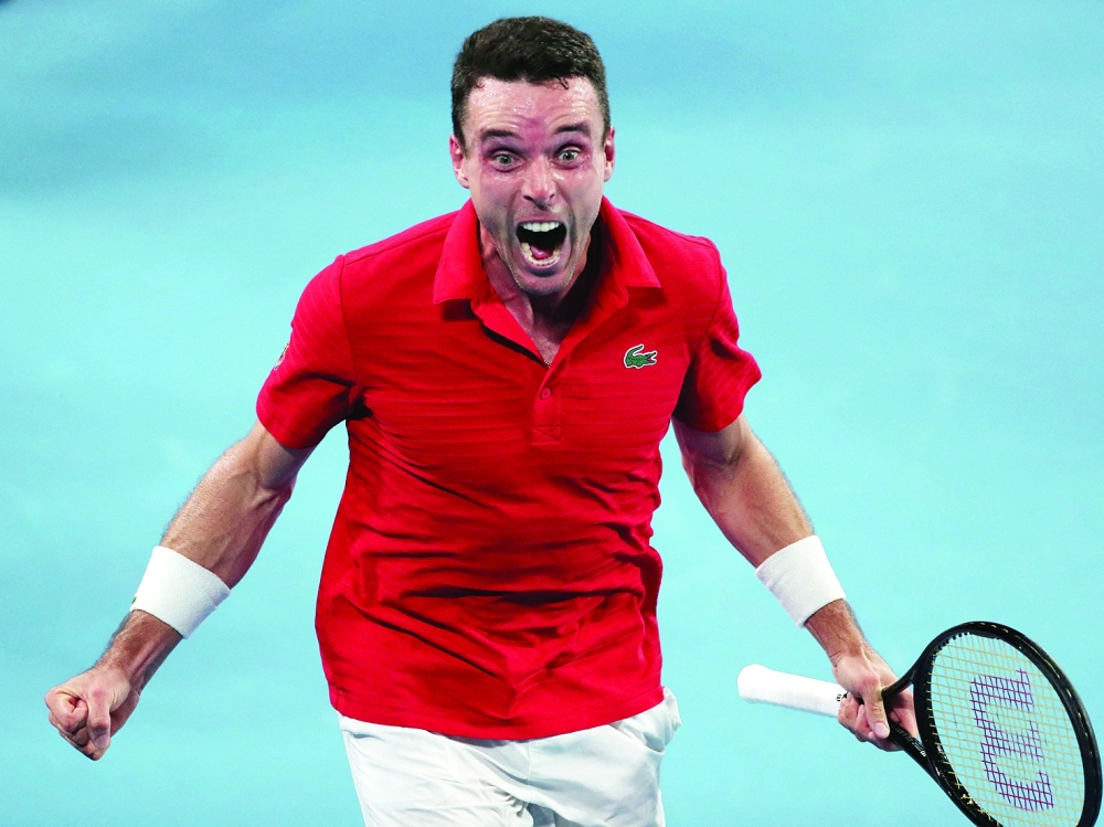 Spain's Roberto Bautista Agut celebrates winning his semifinal match against Poland's Hubert Hurkacz. -- Reuters