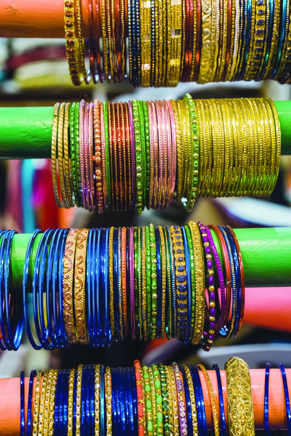 Colorful bangles for sale at Dress Shoppe II in the East Village on Dec. 23, 2021. (Gabriela Bhaskar/The New York Times)