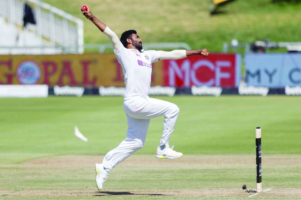India's Jasprit Bumrah delivers a ball during the second day of the third Test cricket match between South Africa and India at Newlands stadium in Cape Town on January 12, 2022. (Photo by Marco Longari / AFP)

