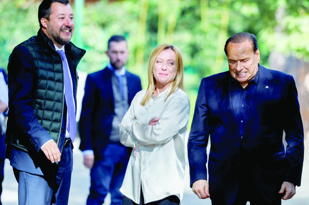 Former Italian prime minister and leader of the Forza Italia party Silvio Berlusconi with League leader Matteo Salvini and Brothers of Italy leader Giorgia Meloni. -- Reuters