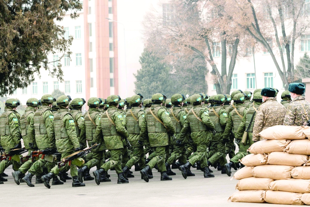 Unidentified Collective Security Treaty Organisation's (CSTO) soldiers attend a ceremony marking the end of the CSTO mission in Almaty. -- AFP