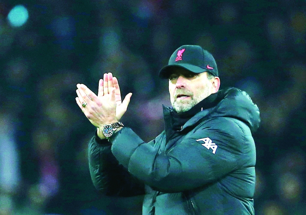 Liverpool manager Juergen Klopp applauds fans after the match. --  Reuters