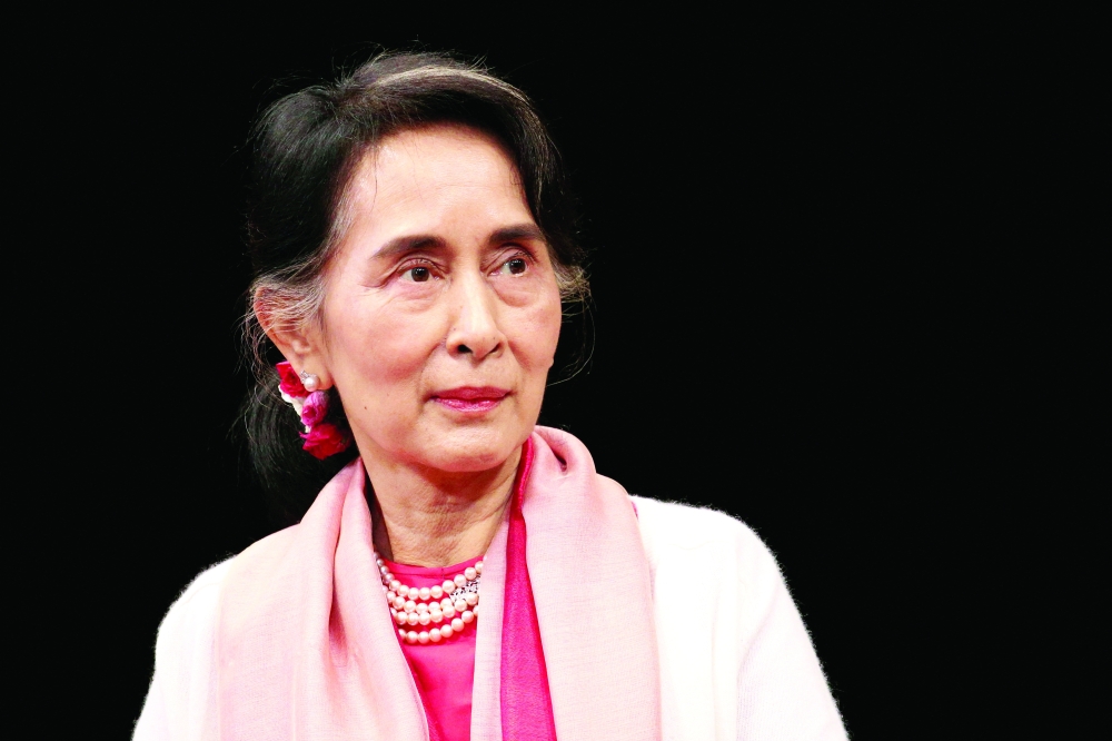 FILE PHOTO: Myanmar's Minister of Foreign Affairs Aung San Suu Kyi speaks during an event at the Asia Society Policy Institute in New York City, U.S. September 21, 2016.  REUTERS/Bria Webb/File Photo