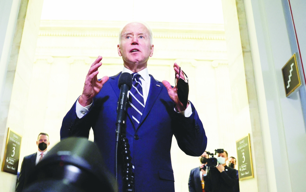 President Joe Biden gestures as he talks with the media following Senate Democratic lunch to discuss the party's push to enact voting rights legislation and possible changes to Senate rules, on Capitol Hill in Washington, on Thursday. - Reuters
