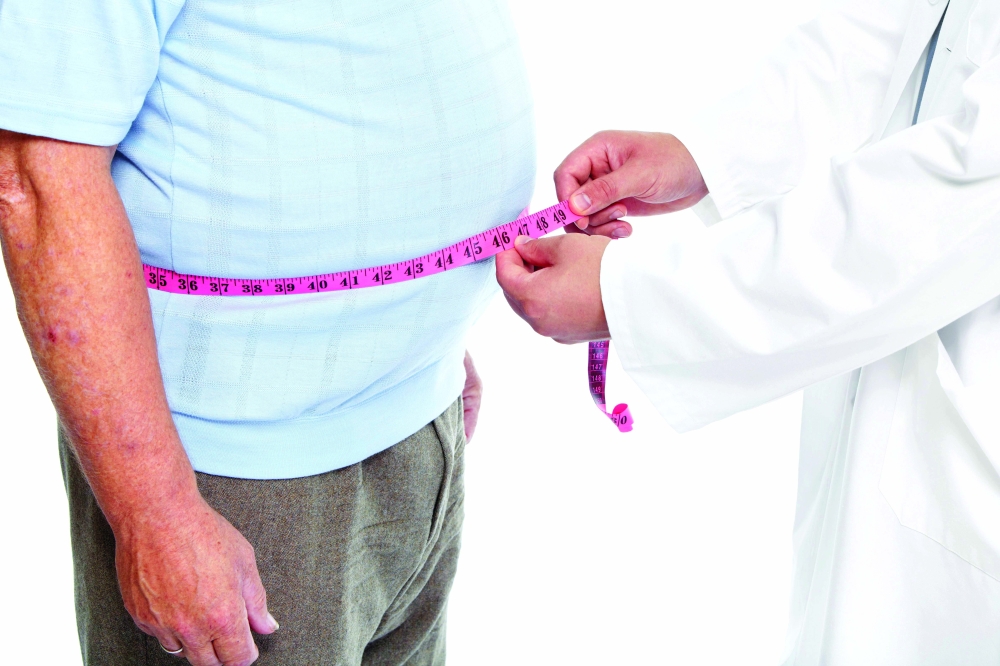 Doctor,Measuring,Obese,Man,Waist,Body,Fat.,Obesity,And,Weight